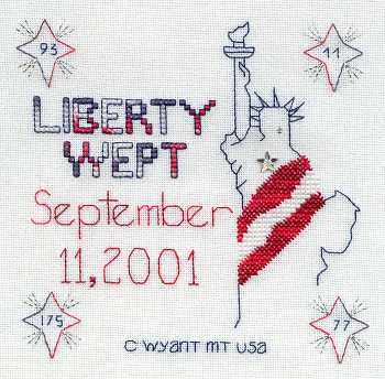 Cross-stitched memorial square by Carmen Wyant