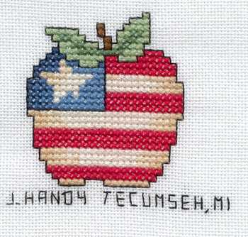 Cross-stitched memorial square by J. Handy