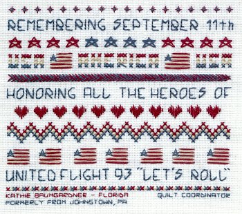 Cross-stitched memorial square by Kathie Baumgardner