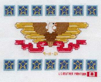 Cross-stitched memorial square by L. Reutner