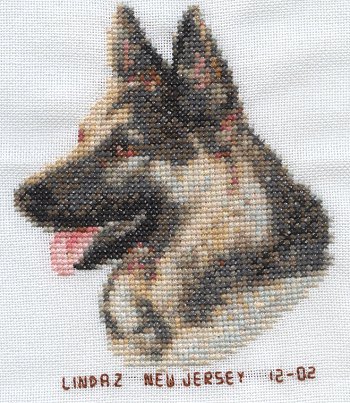 Cross-stitched memorial square by Linda Zuroff