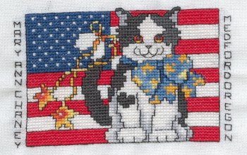 Cross-stitched memorial square by Mary Ann Chaney
