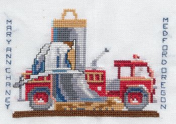 Cross-stitched memorial square by Mary Ann Chaney