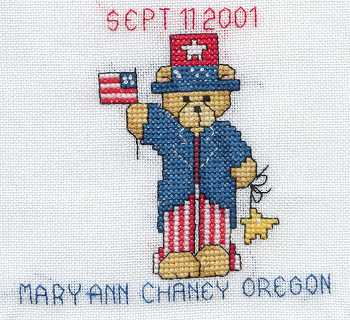 Cross-stitched memorial square by Mary Ann Chaney