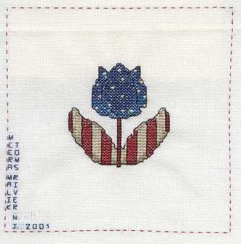 Cross-stitched memorial square by Meera Malik